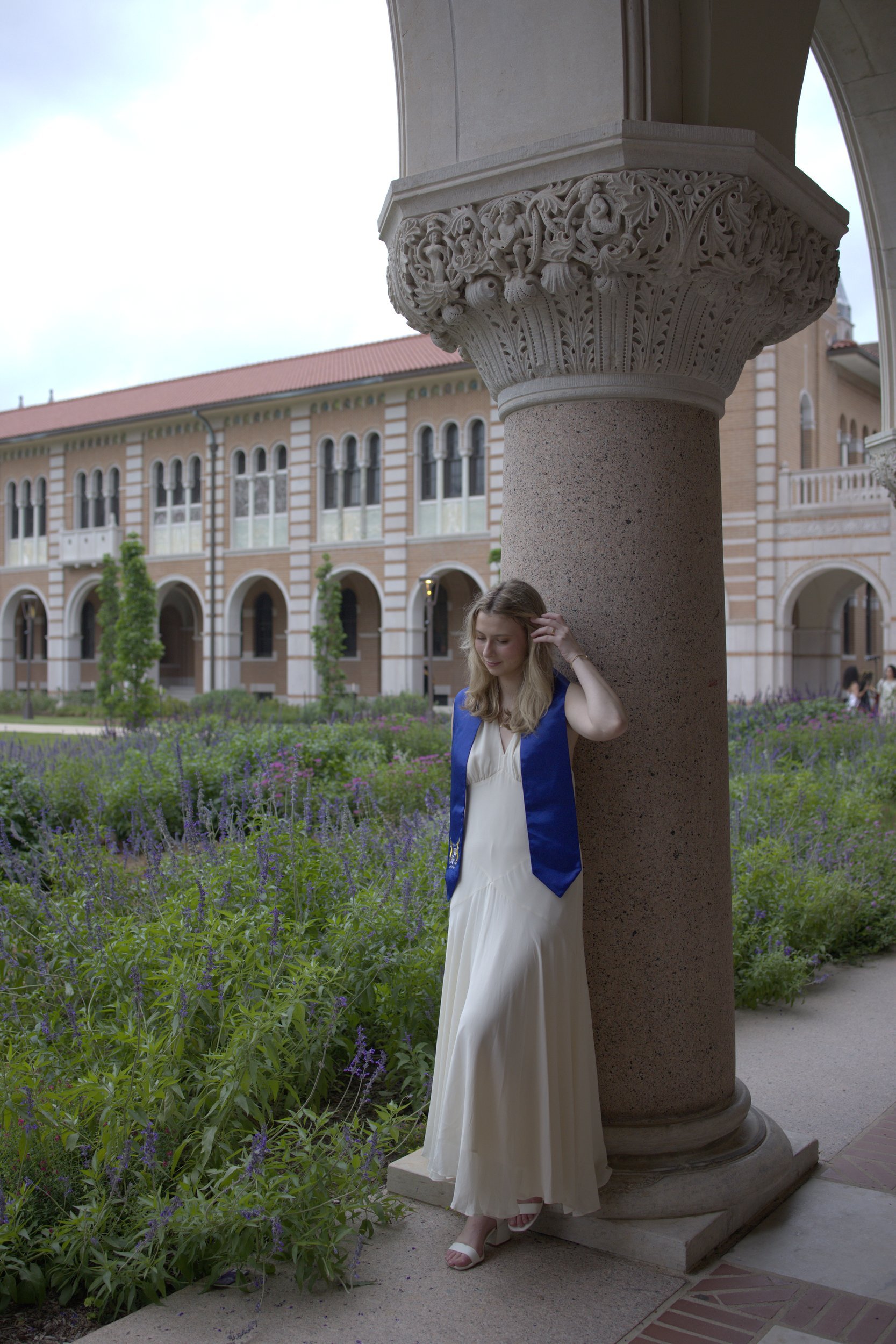 Before: unedited graduation portrait of Caroline