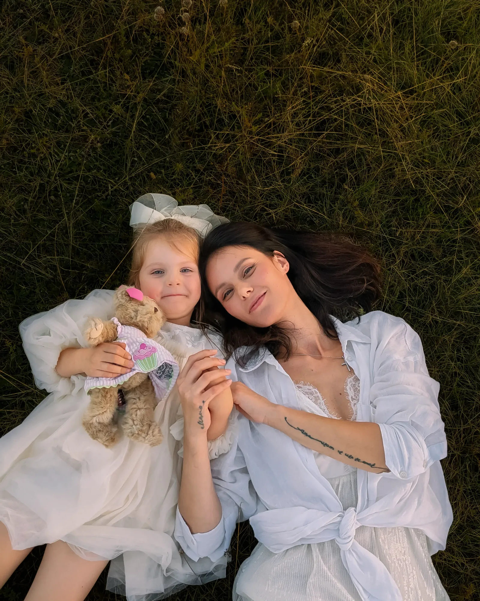 A mother and daughter in a warm, natural family edit